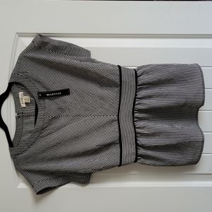 Never worn peplum striped top, flattering pattern